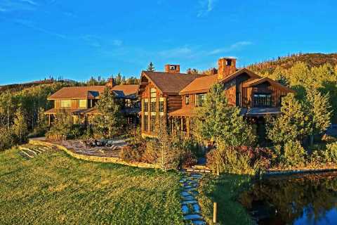 Inside golf legend Greg Norman’s amazing $39.2m, 12,000-acre former estate including private fishing river and saloon