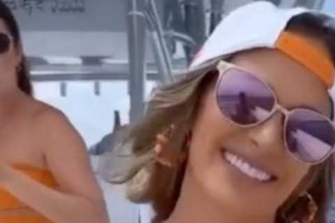 Inside Brooks Koepka and Jena Sims’ Caribbean holiday as golf star and model wife pack on the PDAs on boozy boat trip