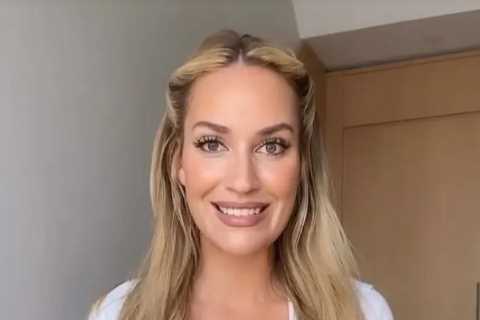 Paige Spiranac stuns in very revealing low-cut shirt as fan jokes ‘that button is doing everything possible to hang on’