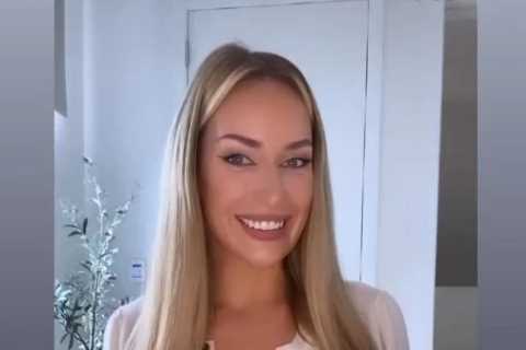 Paige Spiranac almost pops out of shirt as she puts on busty display while warning about fake accounts impersonating her