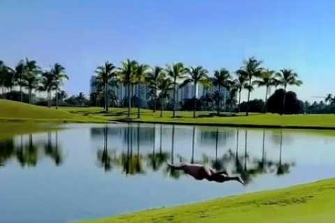 Golf legend John Daly BELLY FLOPS into on-course lake with fans left fearing he’d get attacked by ALLIGATORS