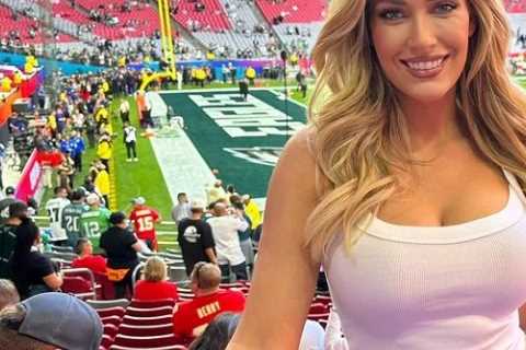 Paige Spiranac branded ‘perfection’ in tight-fitting white top and jeans as she watches Super Bowl from amazing seat