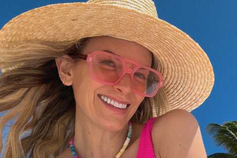 Brooks Koepka’s stunning wife Jena Sims looks sensational in pink bikini as she sips from coconut before LIV golf party