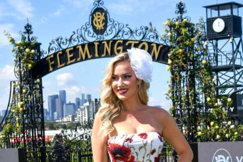 Paige Spiranac gets dressed up for glamorous day at the races after feeding baby kangaroo in Australia