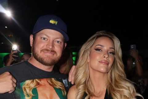 Golf beauty Paige Spirinac parties at The Masters and bumps into fan who has very revealing towel with her body on it