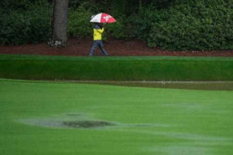 Masters ABANDONED due to torrential rain as fans fume after watching just one hole of leaders on day three