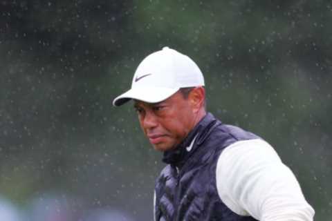 Why has Tiger Woods withdrawn from The Masters?