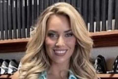 Paige Spiranac shows off her famous curves and legs in figure-hugging mini-dress