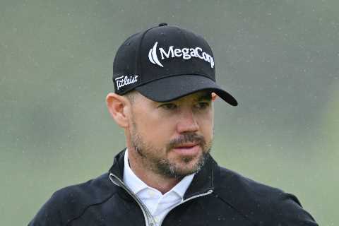The Open fans in hysterics as they spot leader Brian Harman is ‘running a pro shop under his umbrella’ at Hoylake