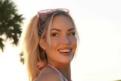 Paige Spiranac risks wardrobe malfunction as she accidentally flashes bum on golf course in Barbie minidress