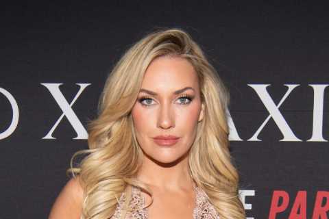 Paige Spiranac looks jaw-dropping in see-through white lingerie and suspenders as she holds jugs off beer